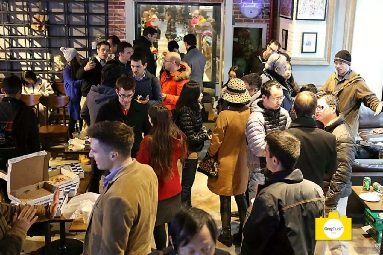 Community members talking together in a café
