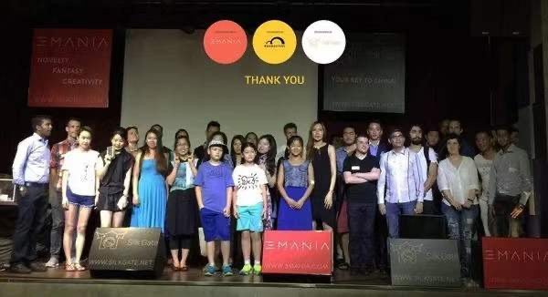 Community participants on a stage after a presentation