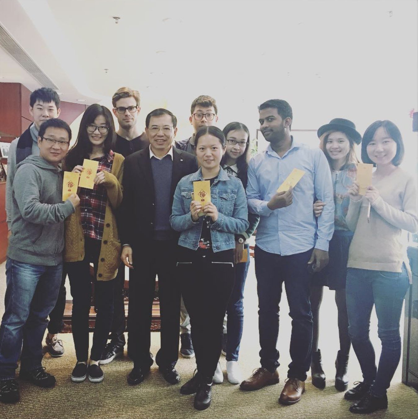 Saravana with TCL Chairman Lee and colleagues celebrating Chinese New Year
