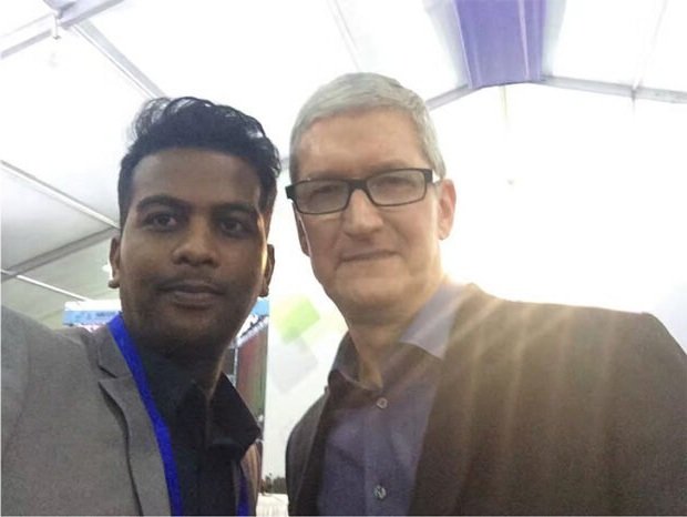 Saravana with Tim Cook at an event in China