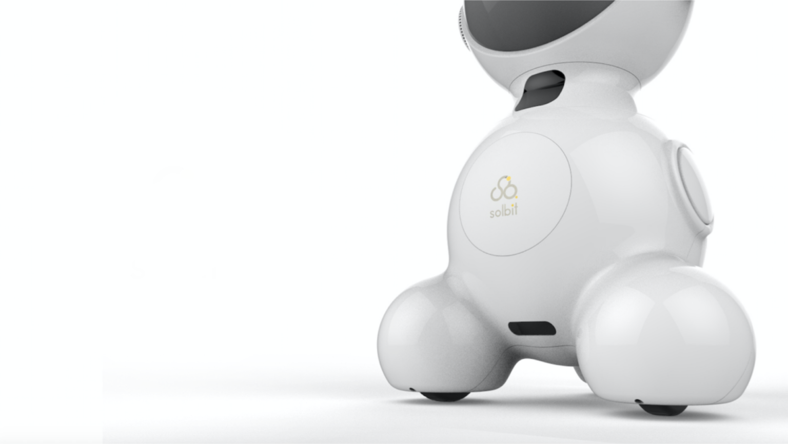 White Solbit robot with a large round head and three wheeled supports